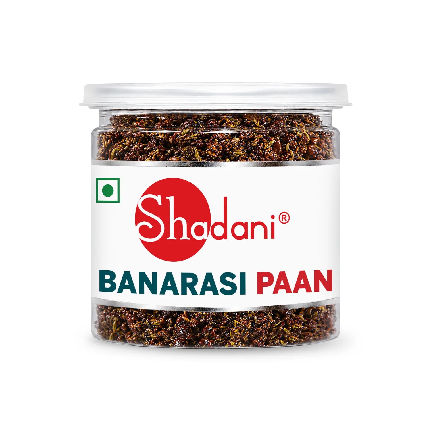 A clear plastic jar of Shadani Banarasi Paan with a white label and a clear lid, showing the dark brown herbal contents inside, on a white background.