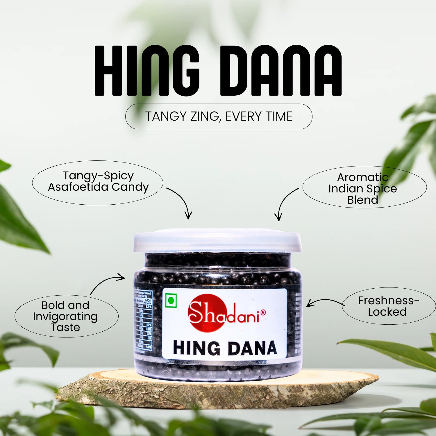 Jar of Hing Dana with Shadani branding on a light background with green leaves.