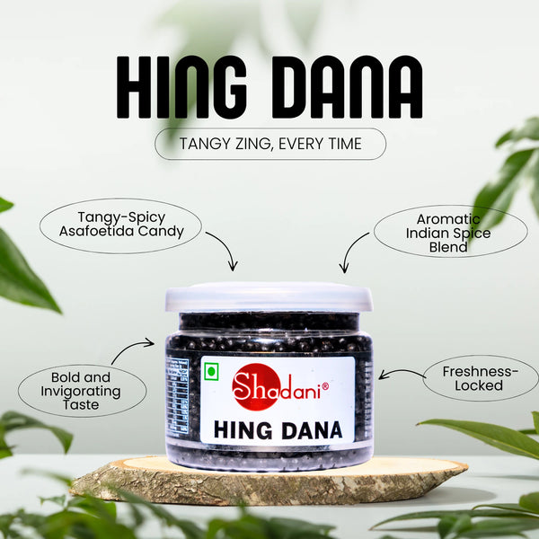 Jar of Hing Dana with Shadani branding on a light background with green leaves.