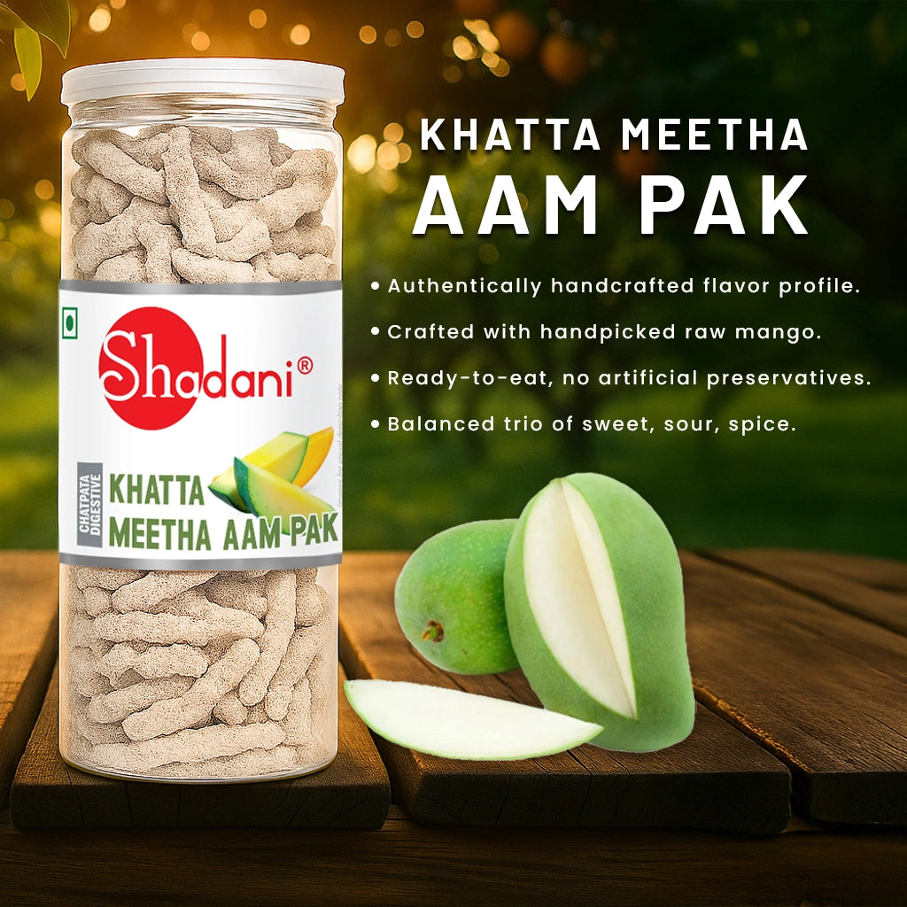 Shadani Khatta Meetha Aam Pak jar with mangoes on a wooden surface