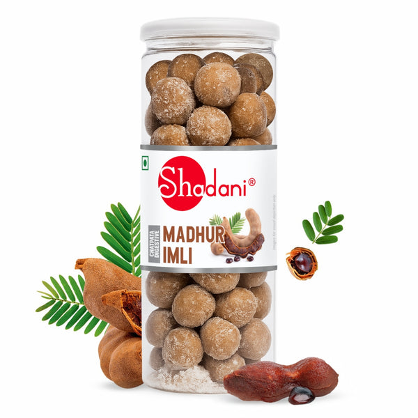 Jar of Shadani Madhur Imli with ingredients on a white background