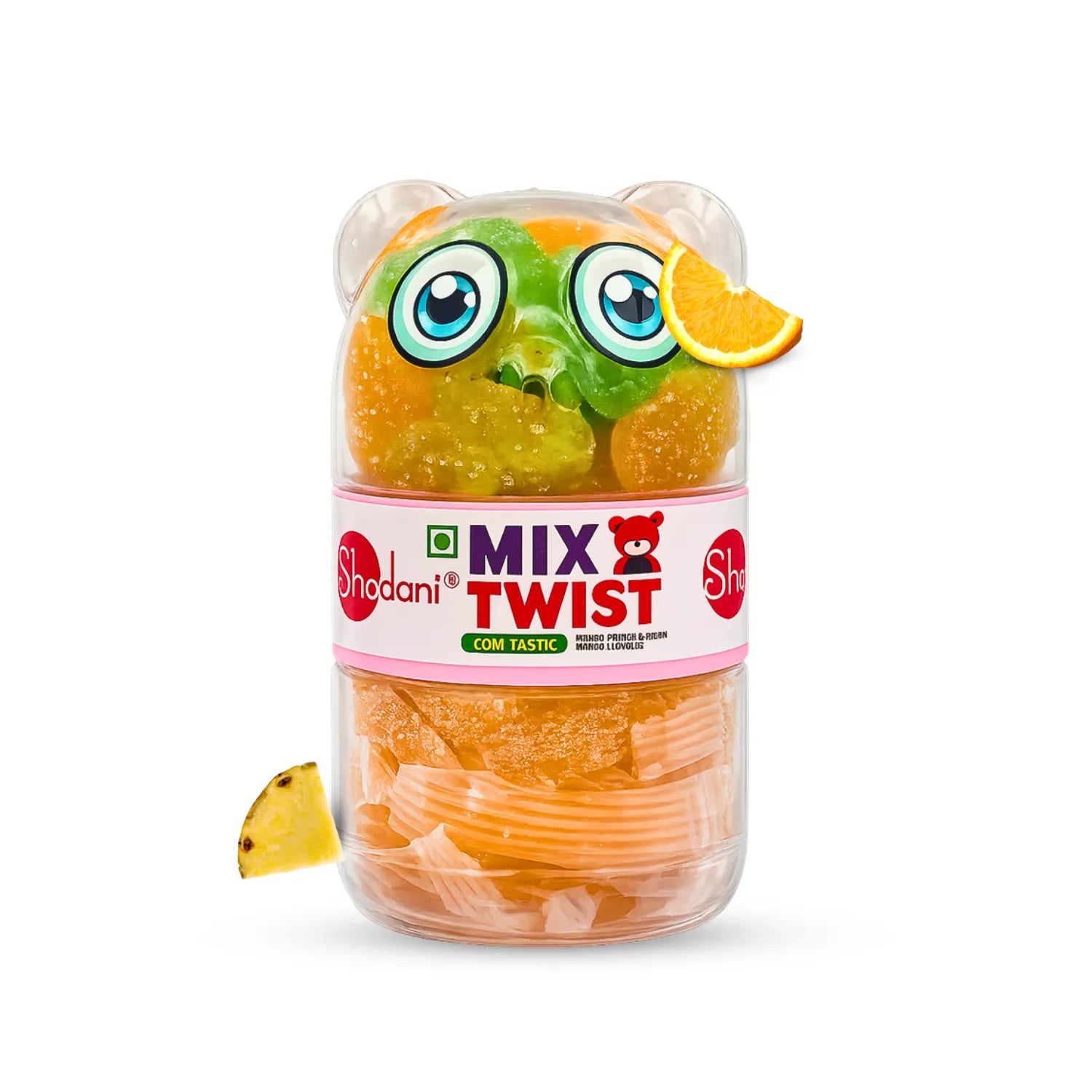 A clear plastic jar of Shadani Mix Twist gummy candy shaped like a bear face, filled with orange and green gummies and topped with a slice of orange, on a white background.