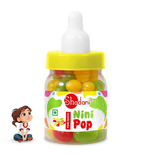 Jar of NiniPop colorful candies with a Shadani label and a small figurine on a white background