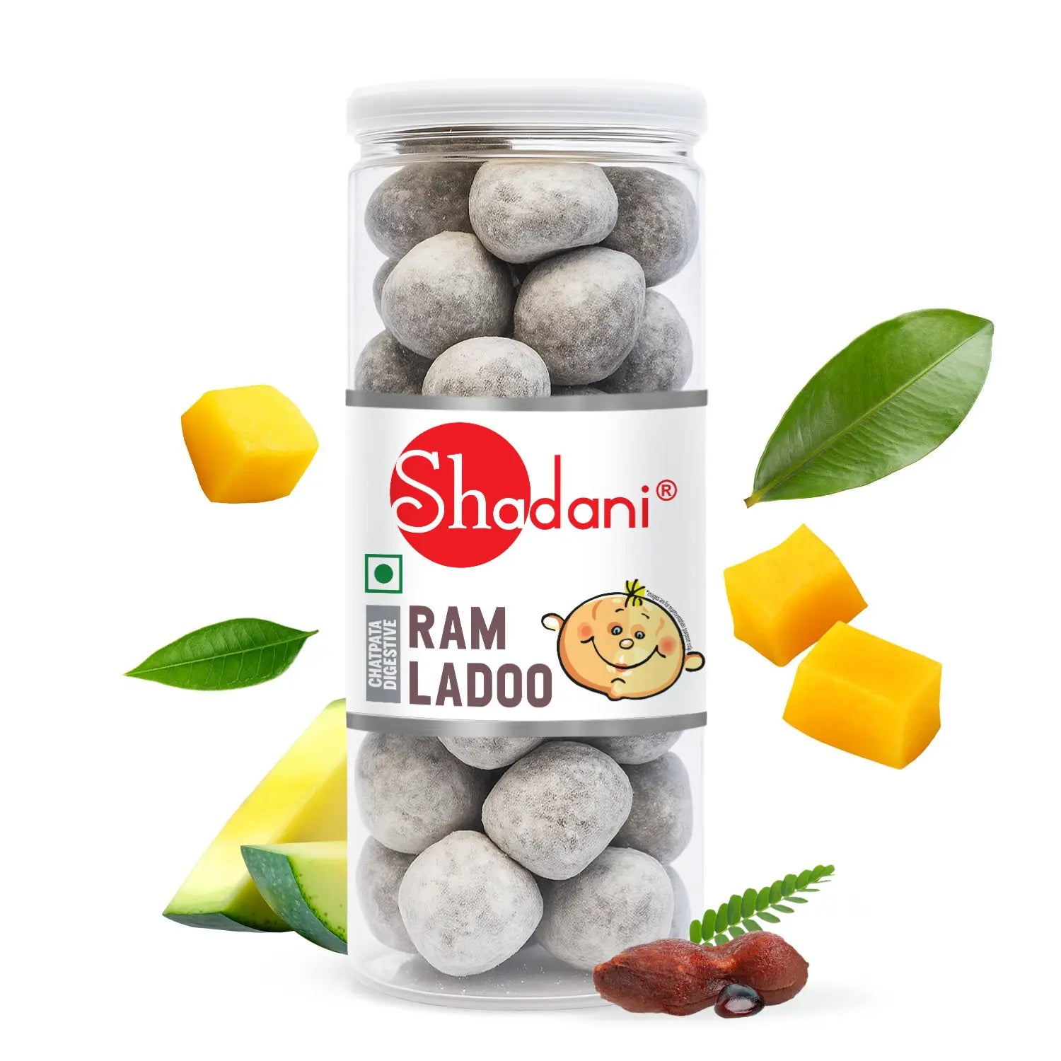 Jar of Shadani Ram Ladoo with lemon, mango, and green leaves on a white background