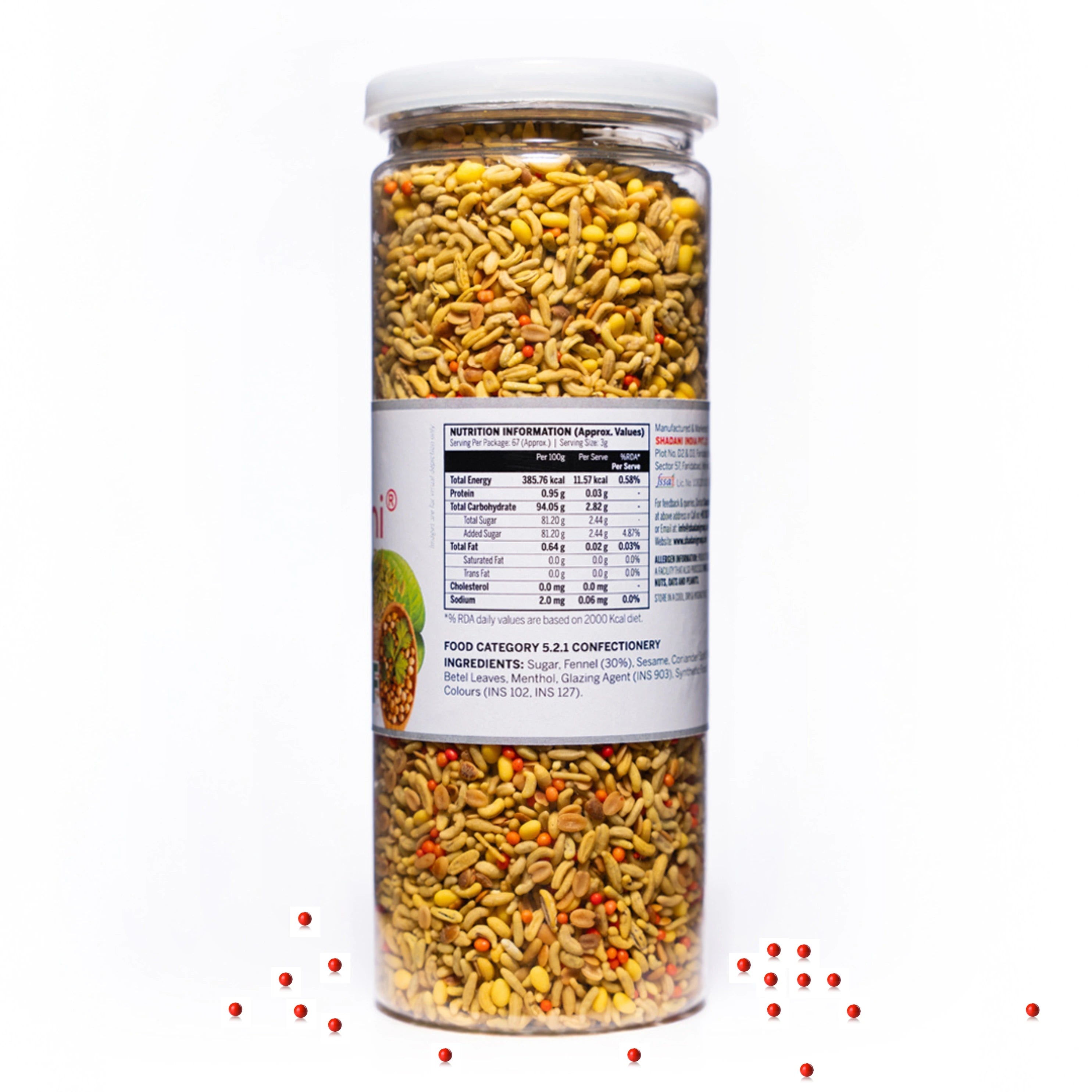 Jar of colorful snack mix with a label on a white background