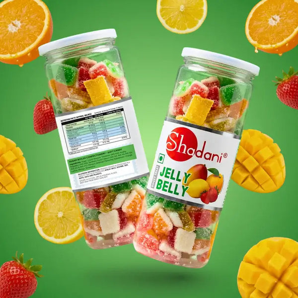 Two jars of Shadani Jelly Belly with fruit gummies on a green background with fruit slices.