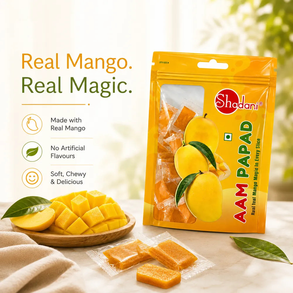 Real Mango Real Magic, Poster of Shadani Aam Papad pouch on surface with real cut mango on plate 
